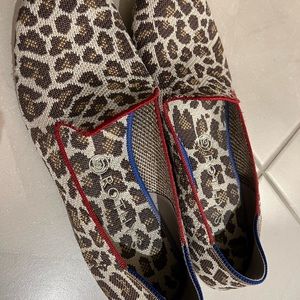 Rothy’s mocha spot leopard print loafers. Tan with red trim.